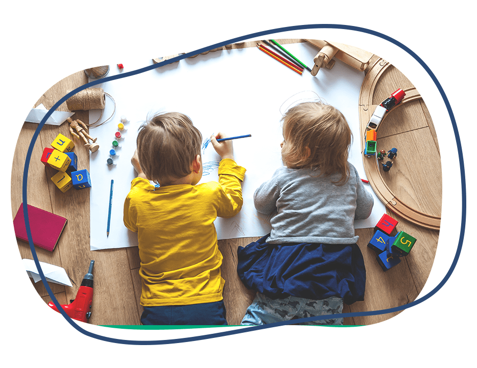 Image of Two Kids Enjoying Playtime With Toys on a Table